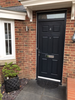 Front door in dark grey satinwood